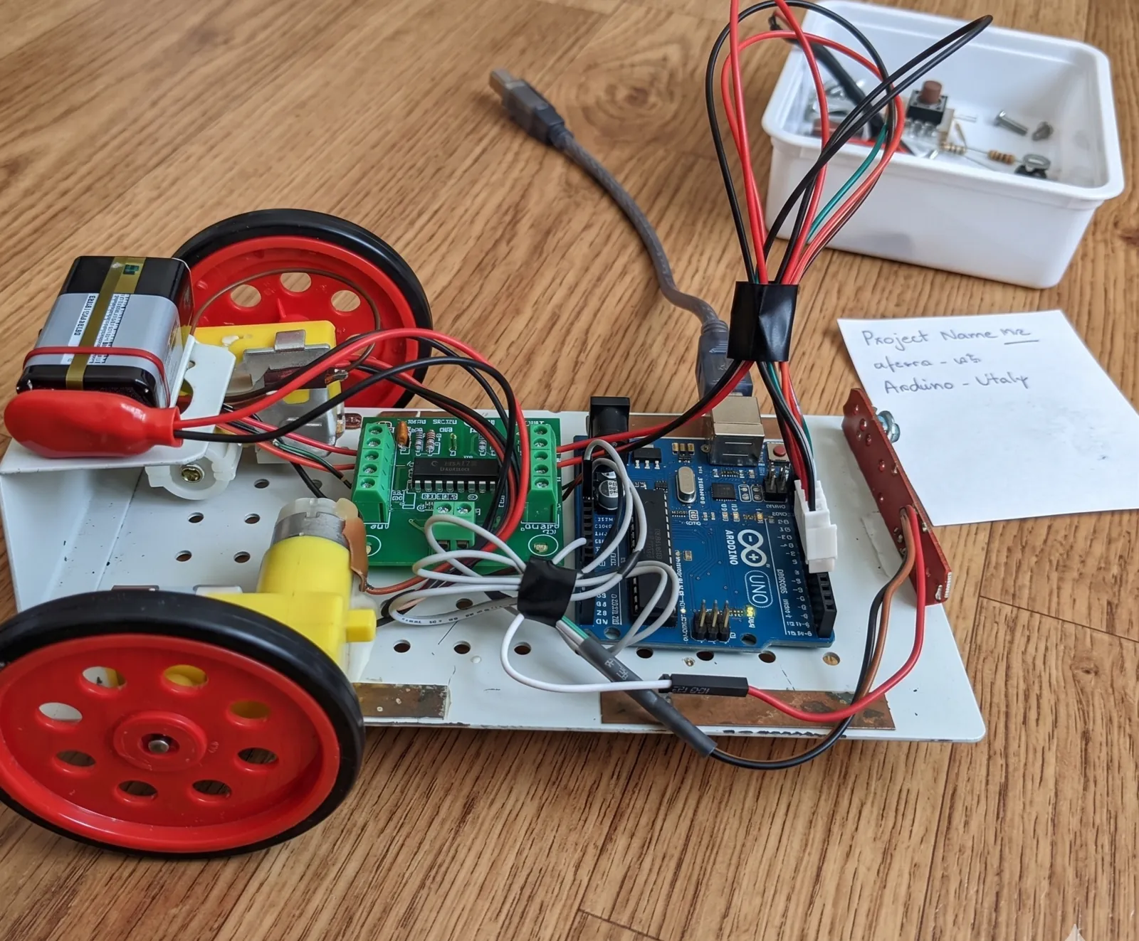 An Arduino-based two-wheeled embedded robot prototype, LabBot 1.0, wired on a white chassis.